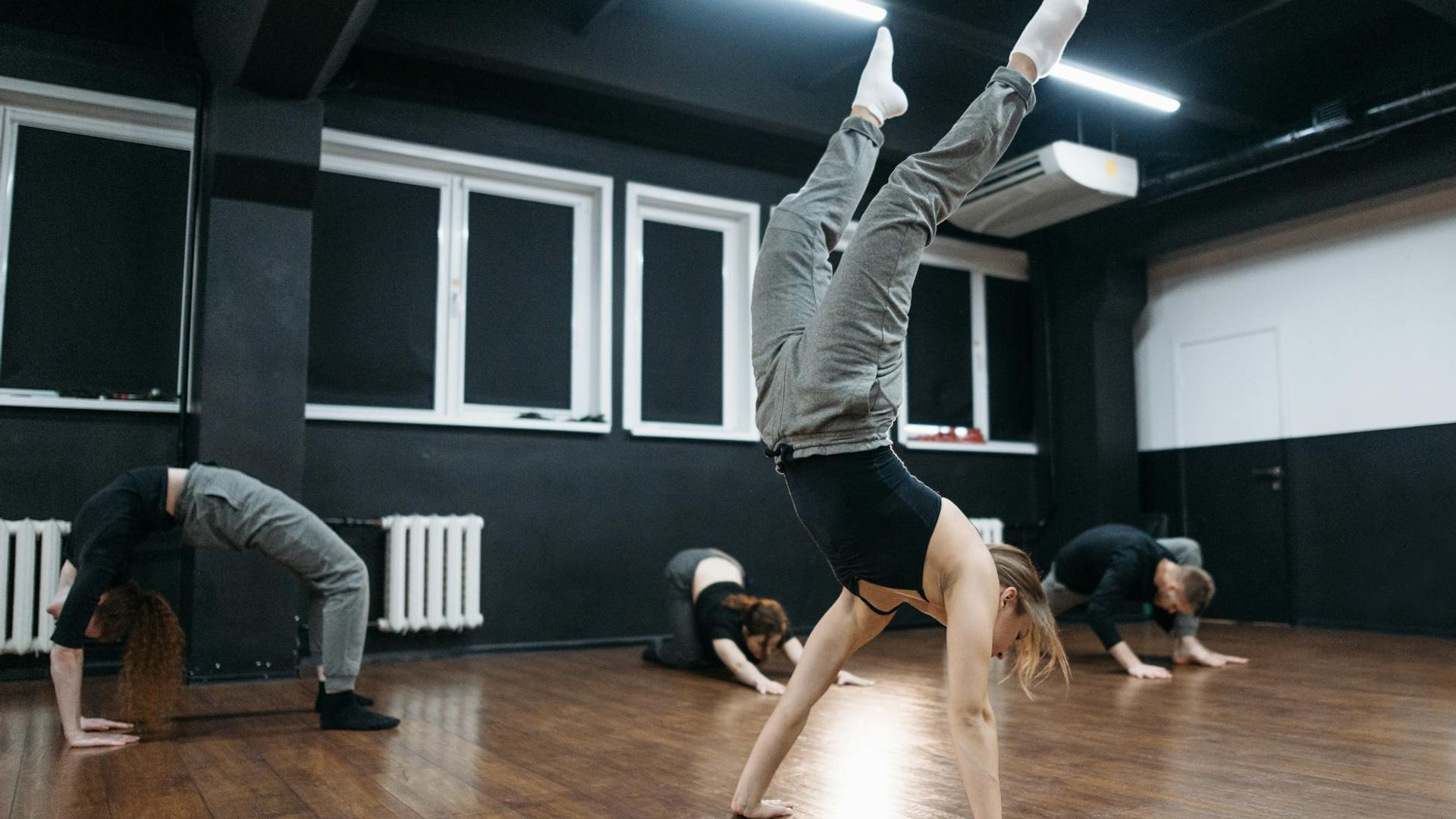 Active lifestyle movement in a dark atmospheric studio setting